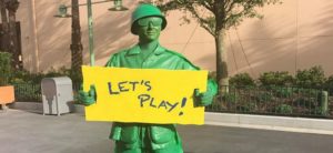green army men man toy story land umbrella